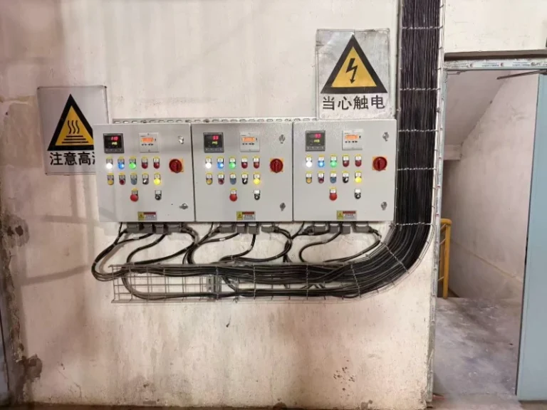 Boiler burner system layout with fan gas train and control panel