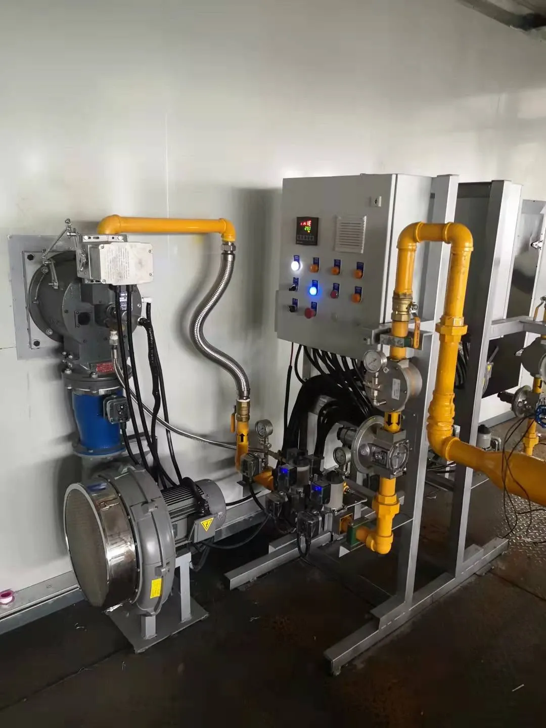 Natural-gas burner, gas piping and control panel installed for an industrial drying system
