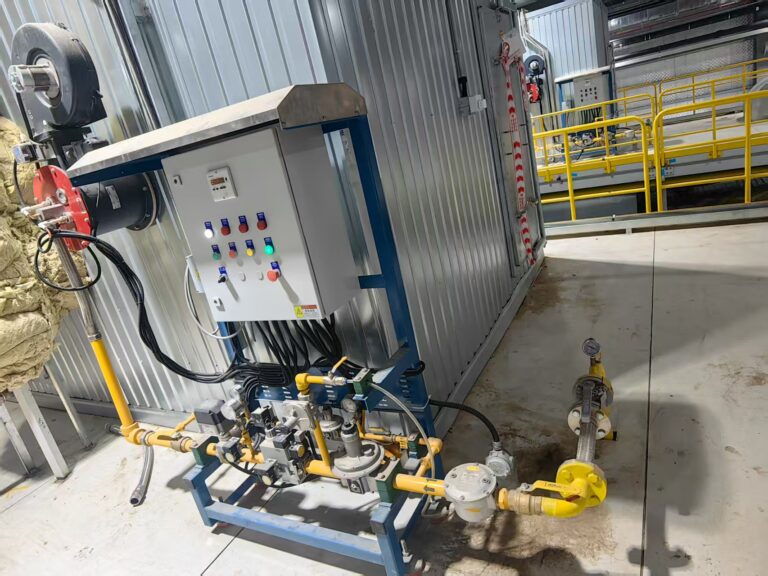 Installed industrial burner system with gas train and control cabinet for a Vietnam automotive project