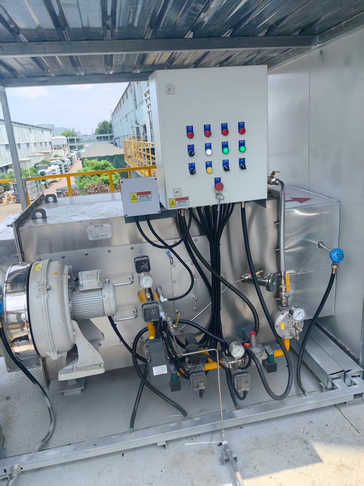 Packaged industrial combustion equipment with fan, valves and control panel
