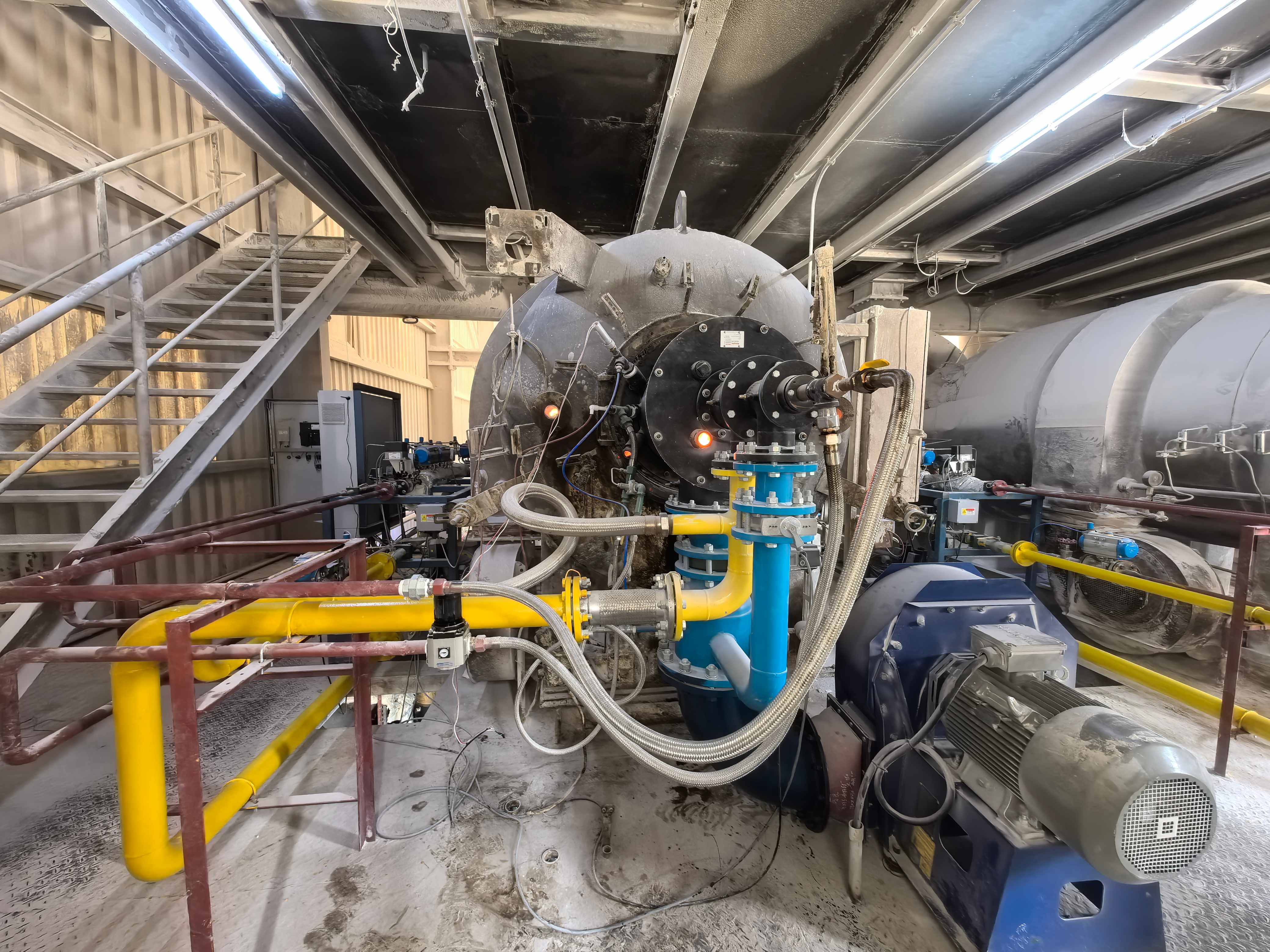 Heatflam industrial combustion system installation with burner, fuel piping and combustion equipment