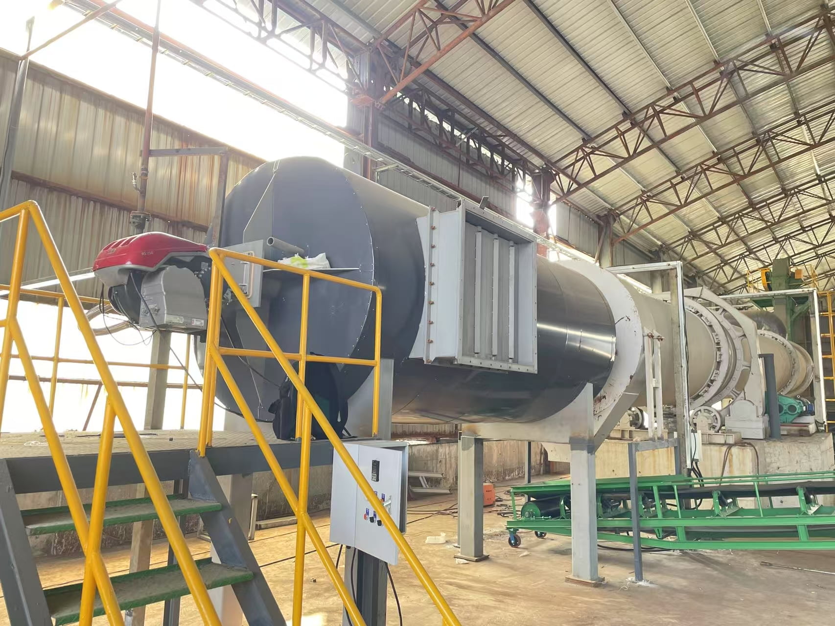 Industrial combustion system installed on thermal processing equipment