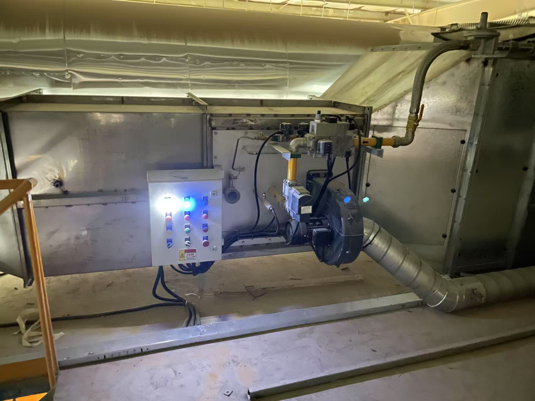 Burner installation on industrial air heating equipment